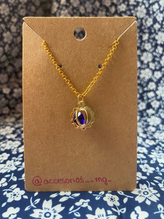 Conjunto de pendientes y colgante diamante azul