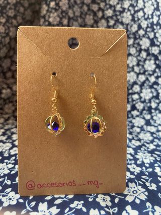 Conjunto de pendientes y colgante diamante azul