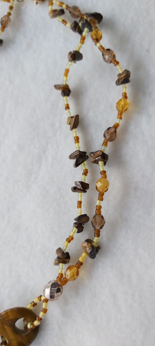 Collana con pietre dure di occhio di tigre,cristal