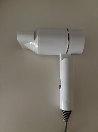 Secador pelo viaje