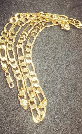 Cadena laminada en oro de 18k 