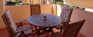 Conjunto mesa y sillas madera exterior