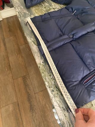 Plumifero hombre azul marino