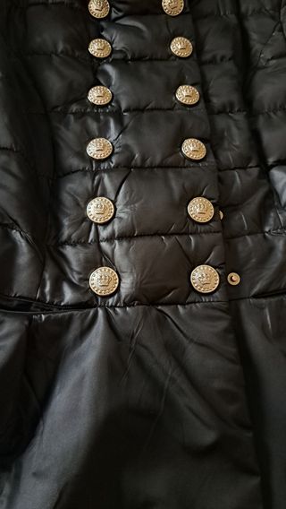 Abrigo negro peplum de Monte Cervino