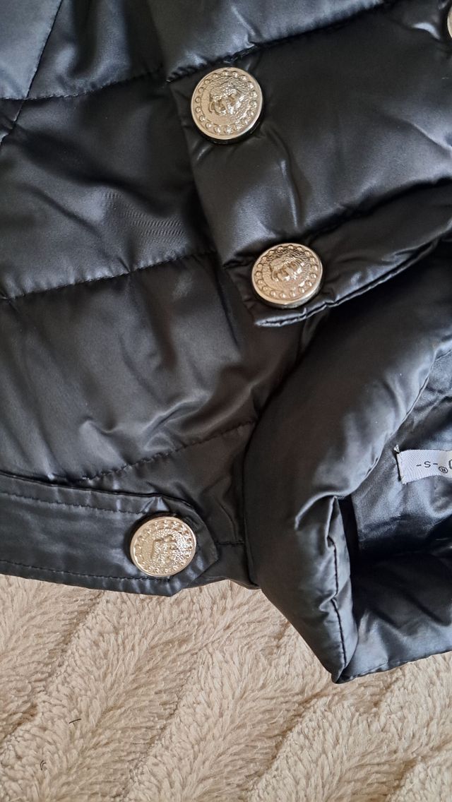 Abrigo negro peplum de Monte Cervino