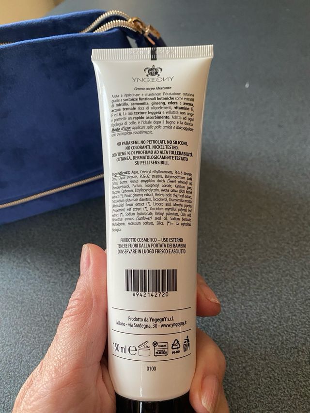 Pochette da viaggio con crema corpo