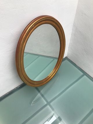 Espejo obalado marco de madera dorado