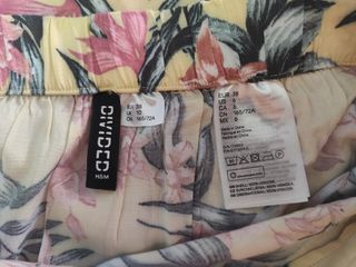 Falda asimétrica H & M talla 38/M estampado flor