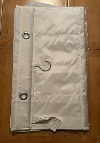 Percha colgador para almacenamiento con bolsillos