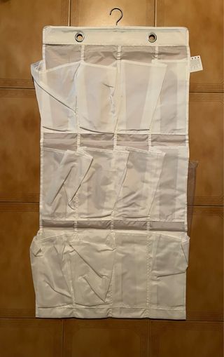 Percha colgador para almacenamiento con bolsillos