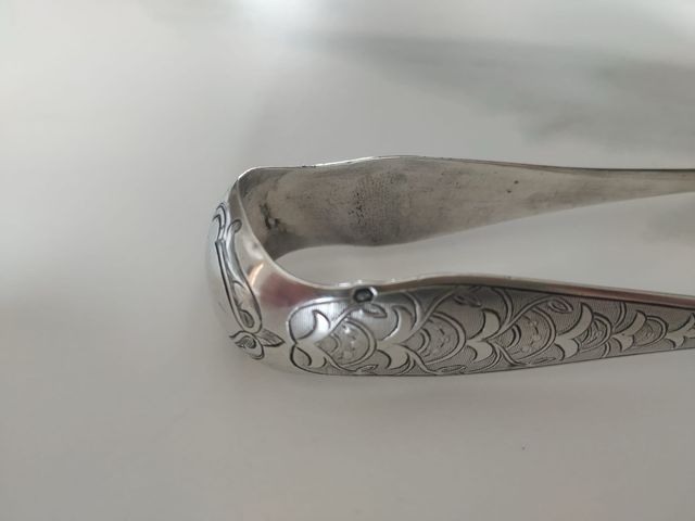 Pinzas plata  con forma de garra