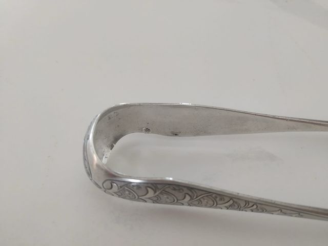 Pinzas plata  con forma de garra