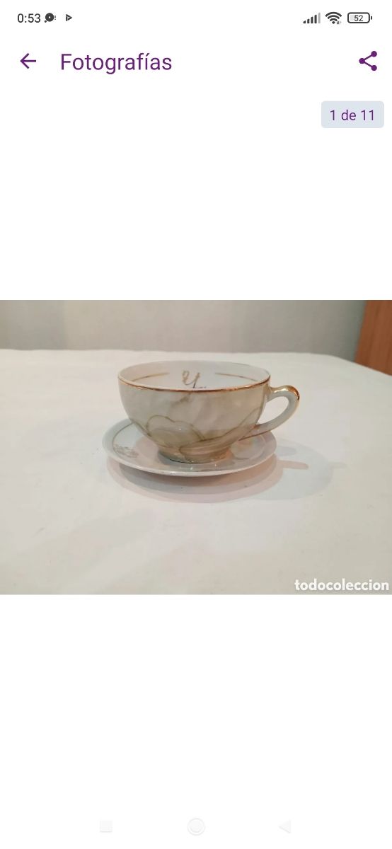 Antigua taza de porcelana fina reflejos