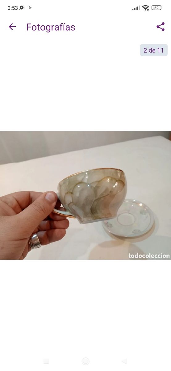 Antigua taza de porcelana fina reflejos