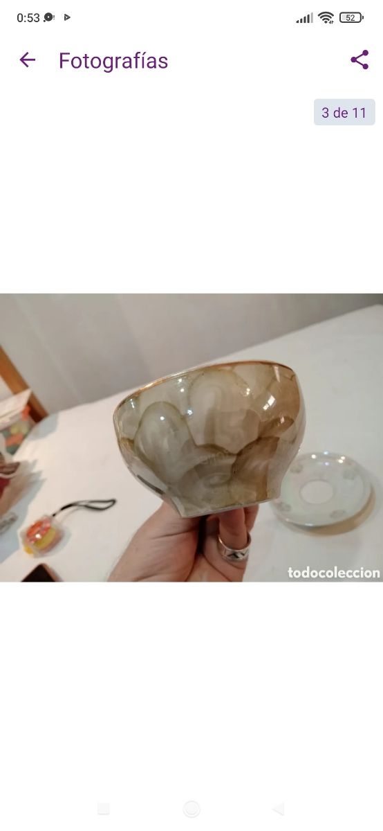 Antigua taza de porcelana fina reflejos