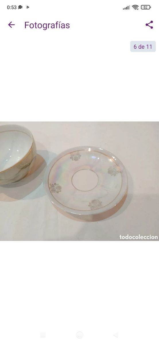 Antigua taza de porcelana fina reflejos