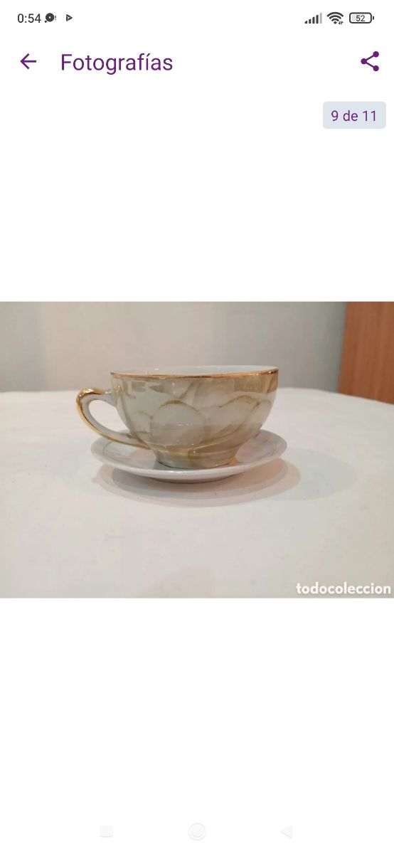 Antigua taza de porcelana fina reflejos