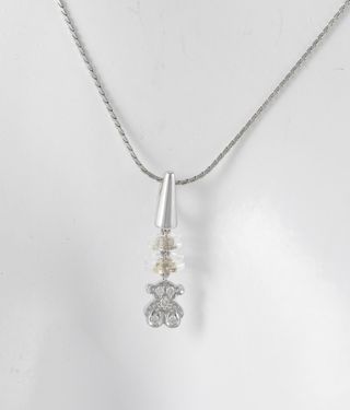 Colgante Tous en oro blanco 18k y diamantes