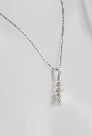 Colgante Tous en oro blanco 18k y diamantes