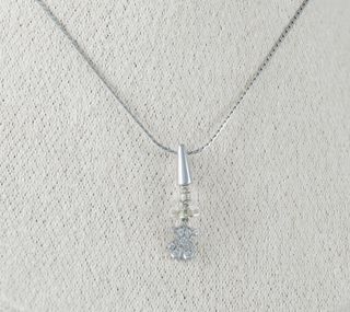 Colgante Tous en oro blanco 18k y diamantes