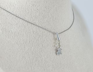 Colgante Tous en oro blanco 18k y diamantes