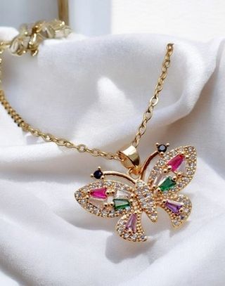 Colgante y cadena acero dorado Mariposa