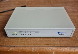 Digicom Firewall + router d link 