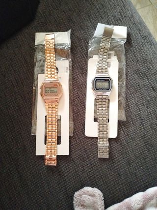 2 relojes nuevos,uno plateado y otro dorado rosado