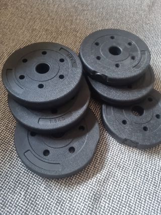 Pesas. Discos. Prácticamente nuevas