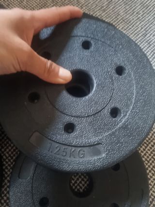 Pesas. Discos. Prácticamente nuevas