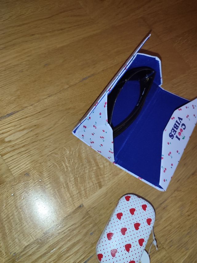 Funda de gafas plegable y joyero