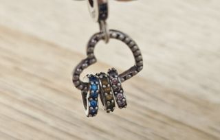 Charms de plata corazón de triple amor