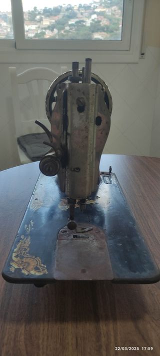 Maquina coser Singer antiguedad con patas forja