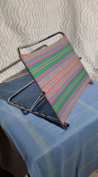 Alzacuscino da letto 