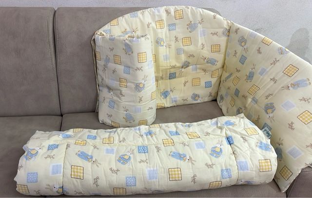 Paracolpi e trapunta lettino