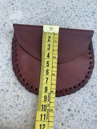 Monedero original de cuero redondo