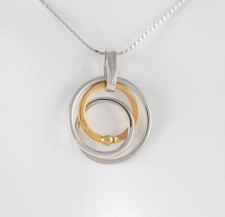 Colgante en oro amarillo y blanco 18k y brillante