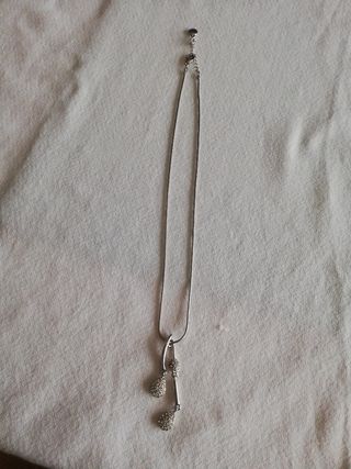 Colgante de acero y brilli brilli 