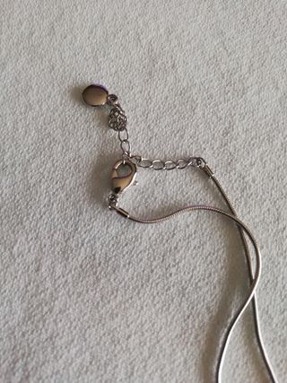 Colgante de acero y brilli brilli 