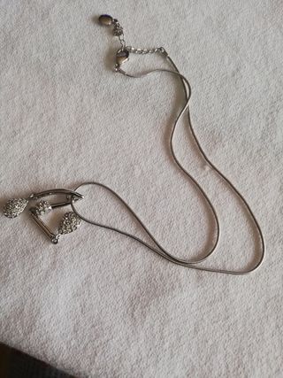 Colgante de acero y brilli brilli 