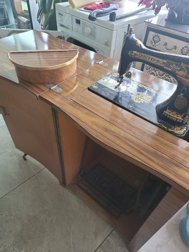 Maquina de coser singer antigua,  venta en persona