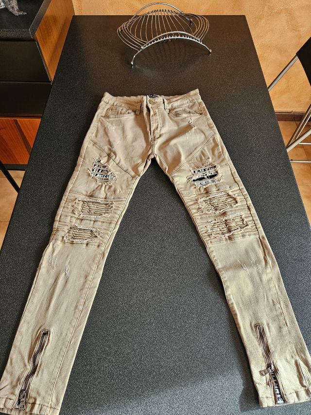 Jeans uomo/ragazzo strappo