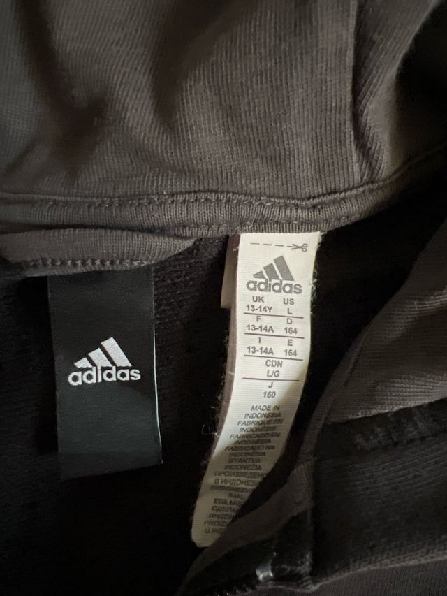 Sudadera adidas talla   13 a 14 años color negro