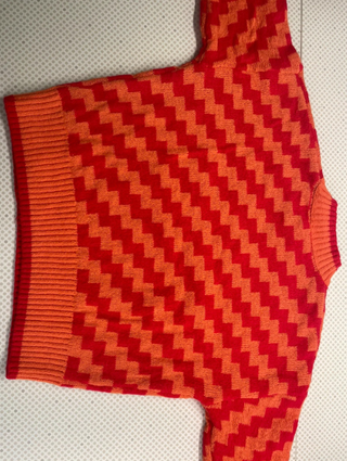 Jersey naranja y rojo