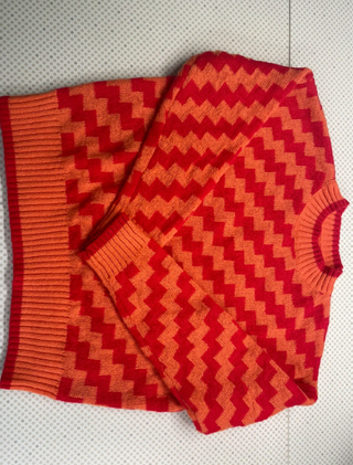 Jersey naranja y rojo