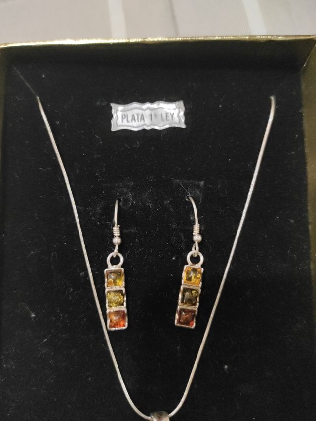 Conjunto plata y ambar