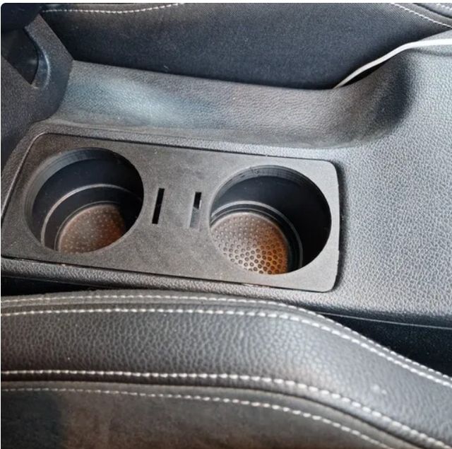 Adaptador porta vasos.