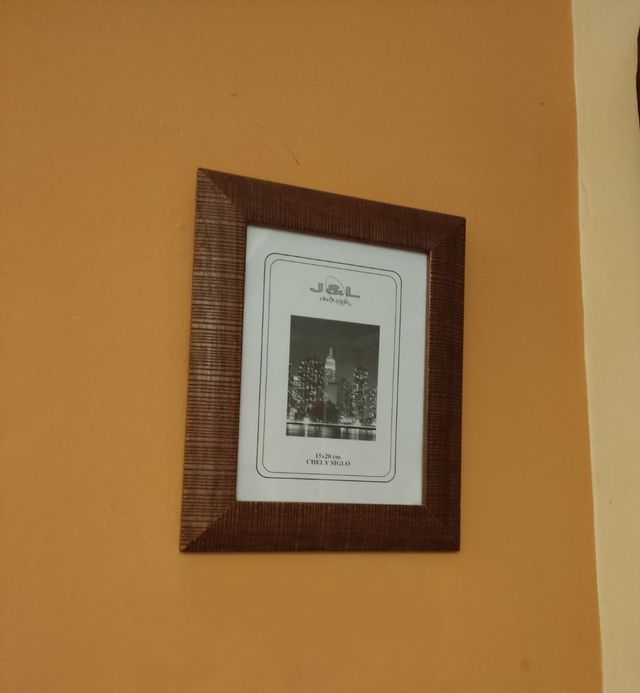 Portafoto in lamiera da parete in legno