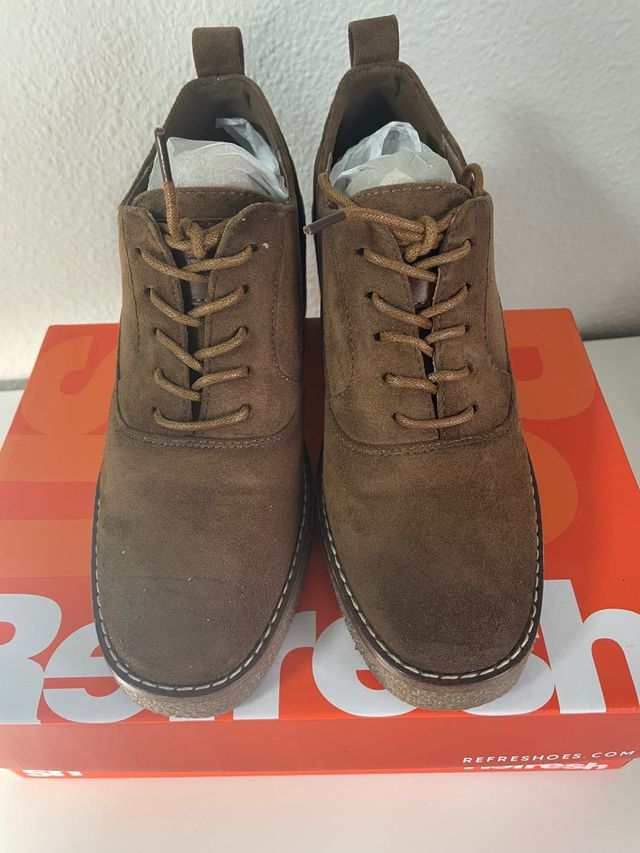 Zapatos botines XTi.