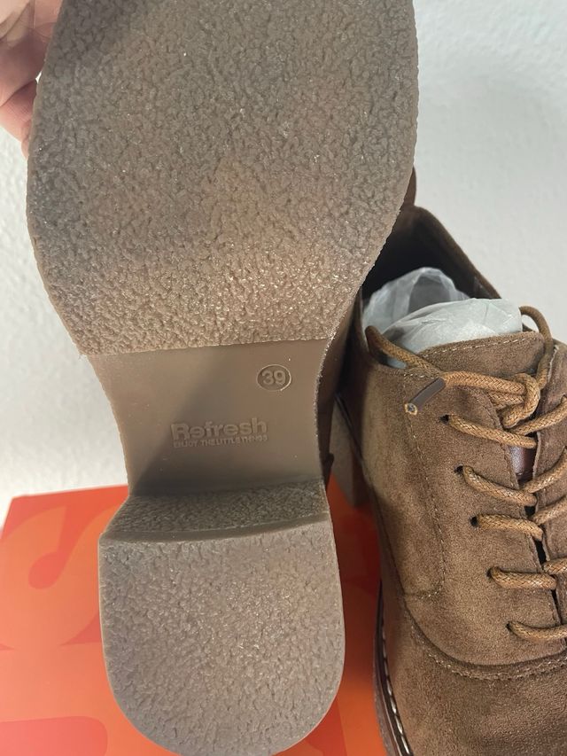 Zapatos botines XTi.